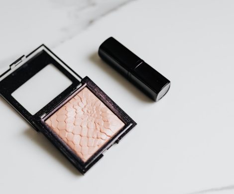 Blush and Lipstick on White Table